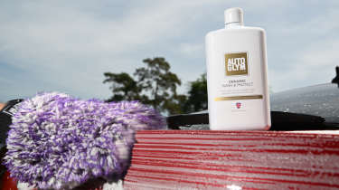 Auto Express products editor Tom Barnard washing a Skoda Superb with Auto Glym Ceramic Shampoo